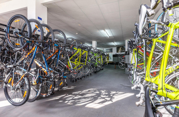 Lots of bikes stored on racks